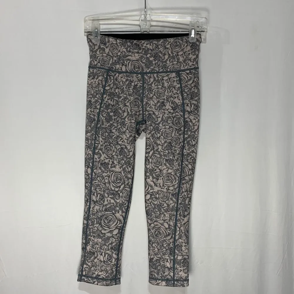 SWEATTY Betty reversible floral/solid black leggings women’s